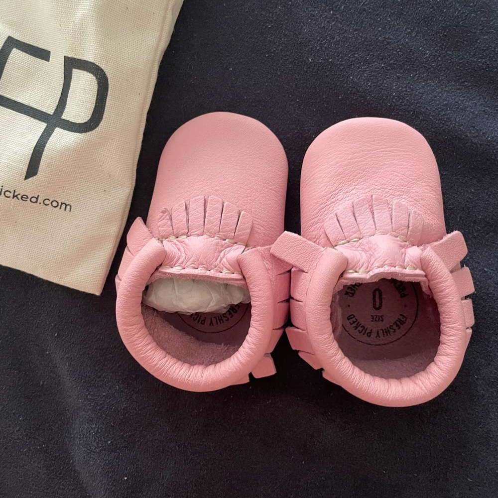 Pretty freshly picked baby shoes never worn